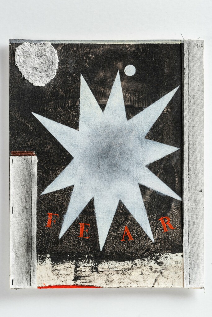 Dark canvas with large white star in the center and the word "FEAR" in red